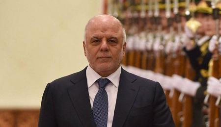 العبادي يضع اكليلا من الزهور على نصب الجندي المجهول