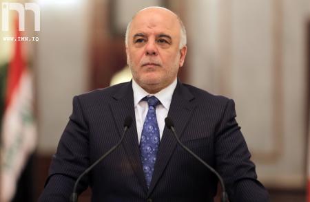 العبادي يكرم [أم قصي] لانقاذها 25 جندياً من سبايكر