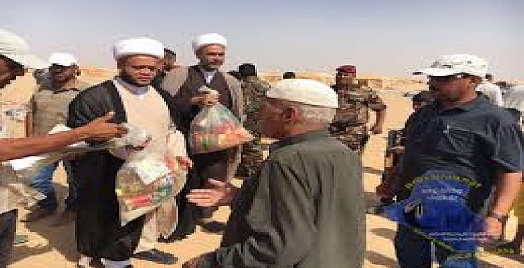 المرجعية توزع مساعدات بين أهالي القيارة