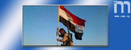 رفع العلم العراقي فوق جسر البو فراج بالانبار