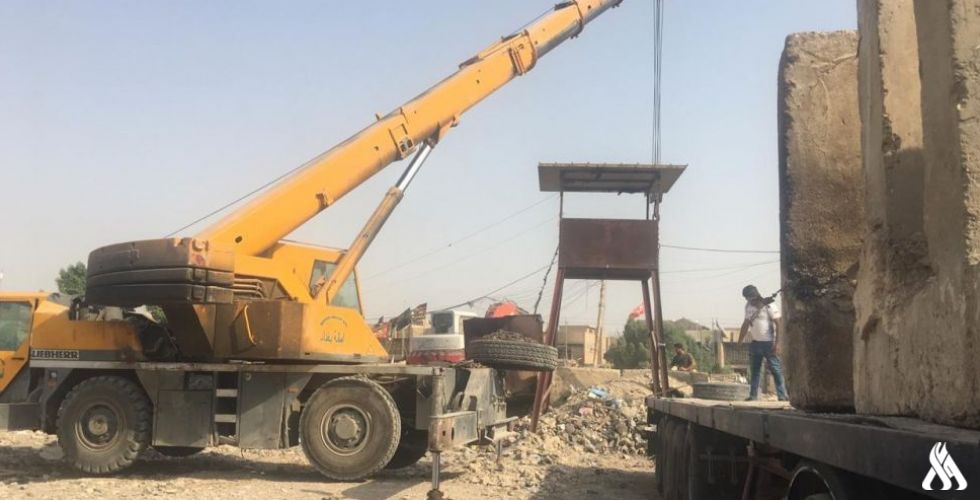 رفع الحواجز الكونكريتية عن ثلاثة مواقع مختلفة في بغداد
