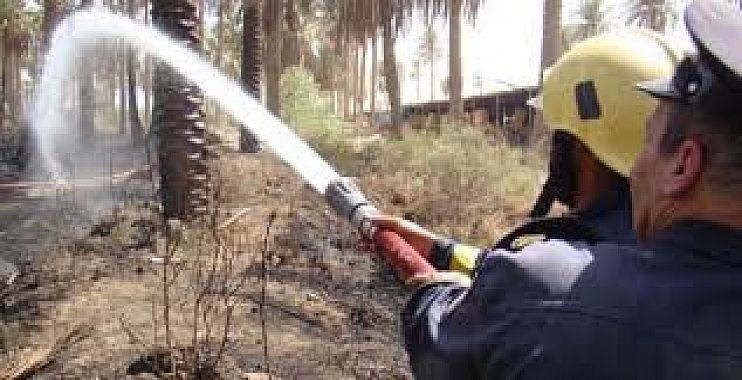 اخماد حريق في احد بساتين جرف النصر اثر تماس كهربائي