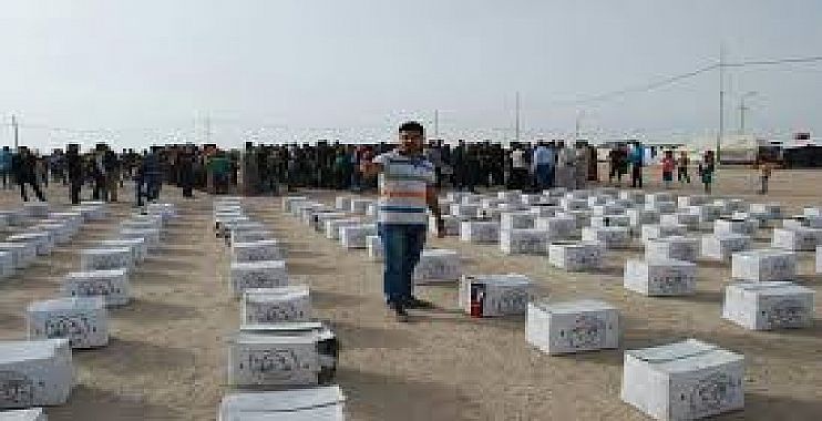 الهجرة : توزيع قرابة 31 الف حصة اغاثية للنازحين في ثلاث محافظات