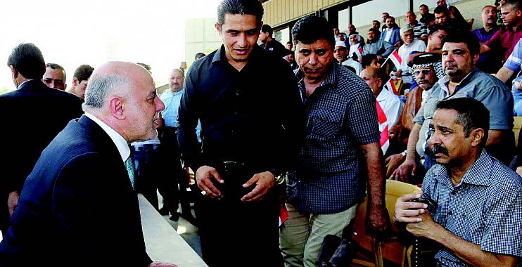 العبادي يشارك القوات الأمنية وعوائل الشهداء الاحتفاء بالنصر